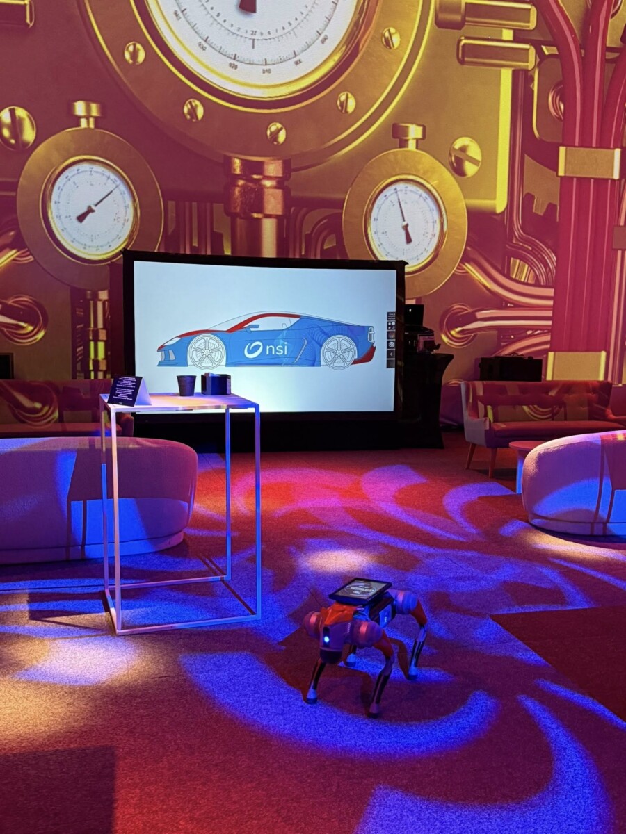 Animations futuristes signées Just WAOUH lors de la fête du personnel NSI au Château d’Hélécine : chien robot interactif et Digital Graffiti.
